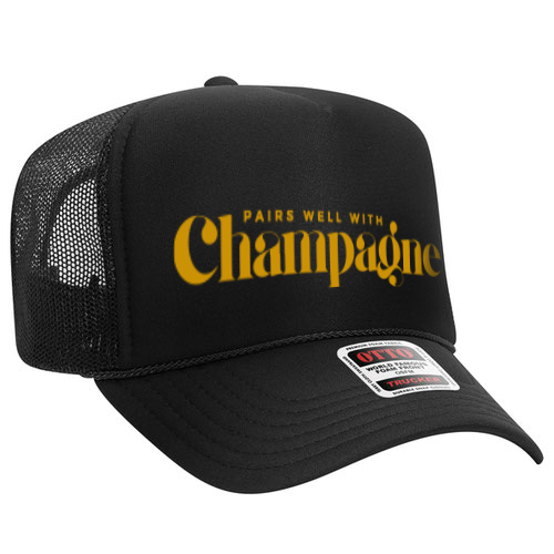 Black cap with 'Pairs Well With Champagne' text on a white background nye new years eve corkie wine lover hat