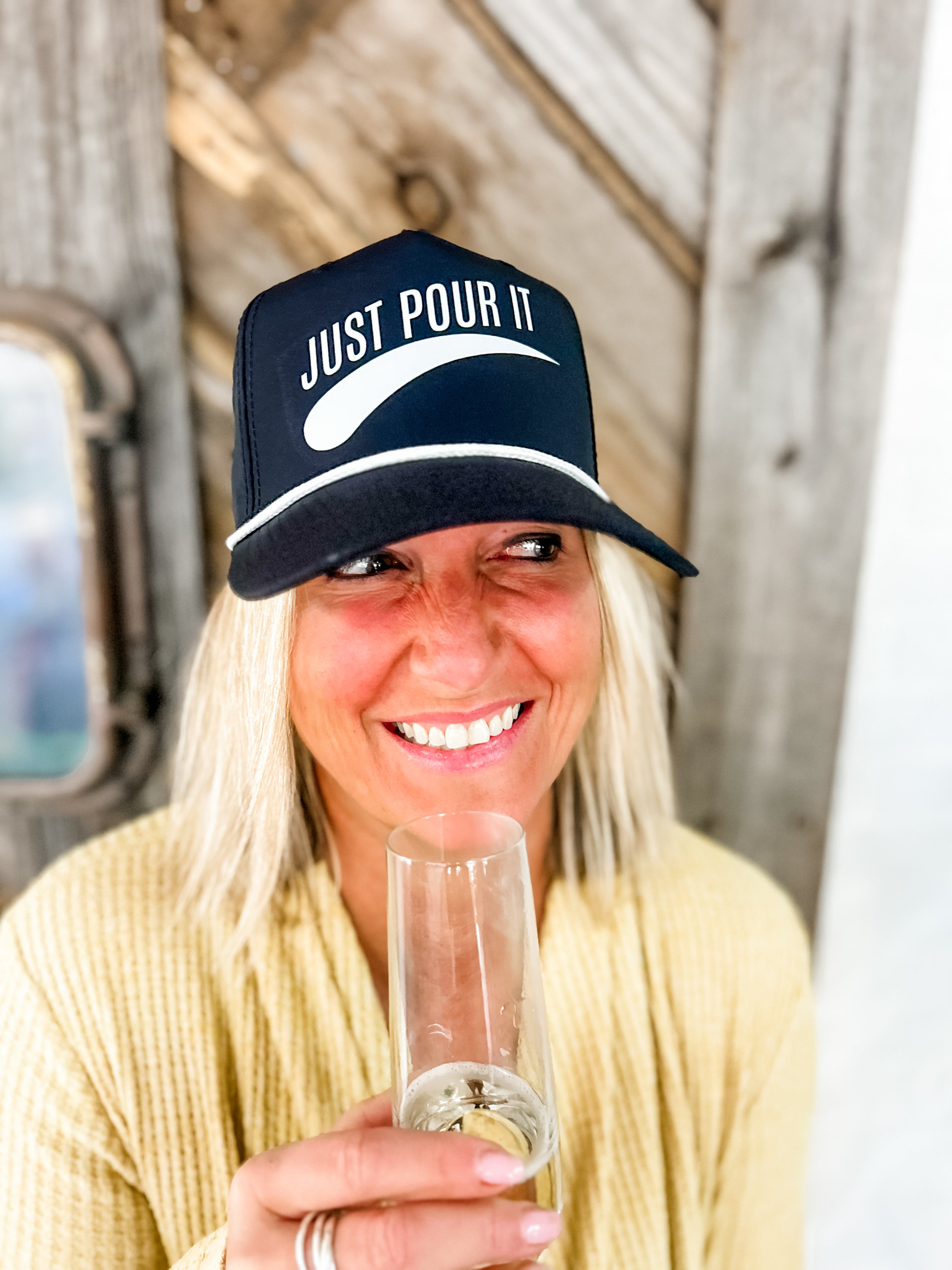 corkie wine lovers apparel black trucker just pour it trademark